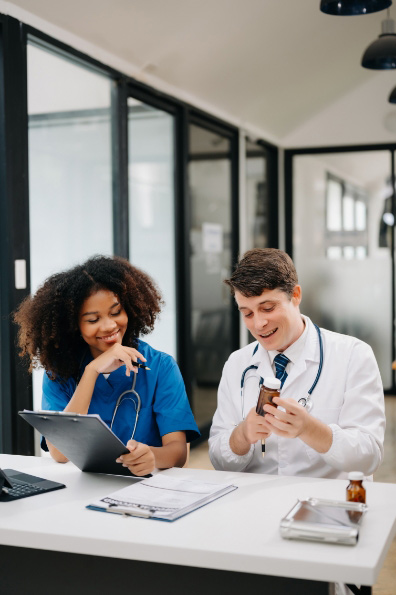 medical professionals discussing the drug options for their patient