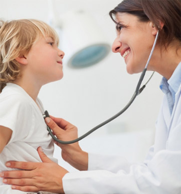 Woman doctor with young child